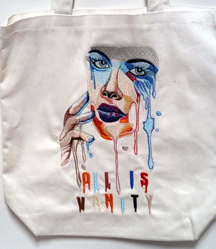 White machine embroidered face Tote Bag