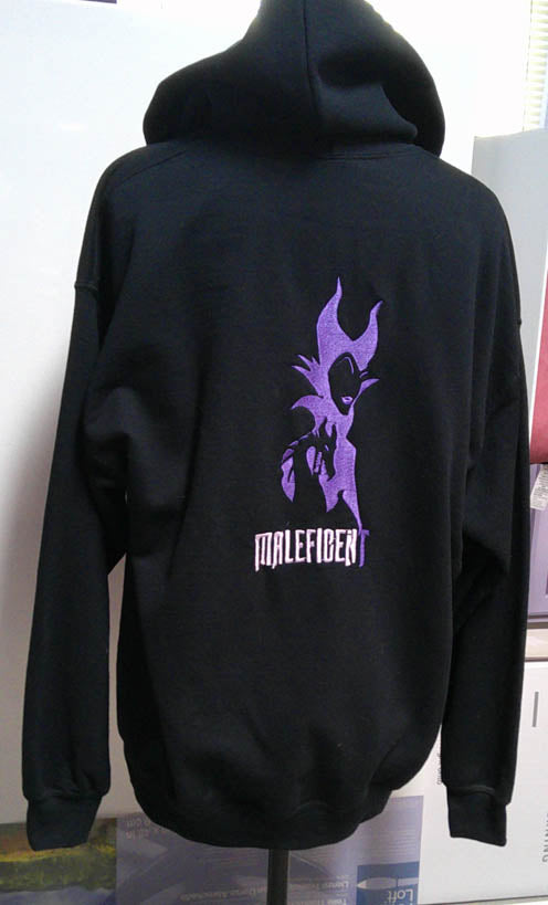 Black hooded one of a kind sweatshirt with evil villain machine embroidered on back.  Size L