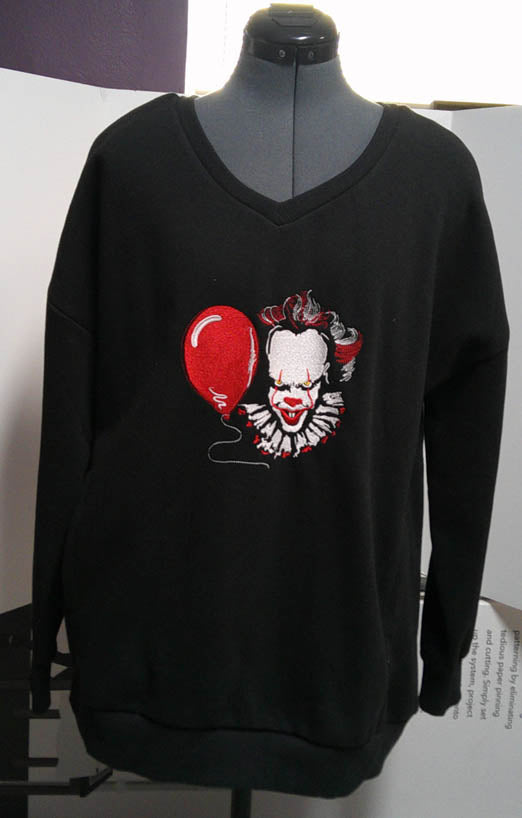 Black V neck one of a kind sweatshirt with machine embroidered evil clown.  FREE SHIPPING Size L