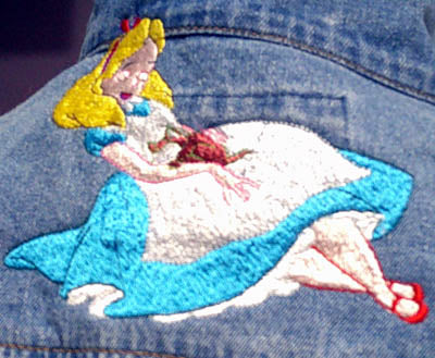 Repurposed one of a kind machine embroidered denim jacket.  Size M  FREE SHIPPING