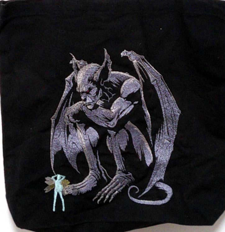 Black gargoyle and fairy tote bag