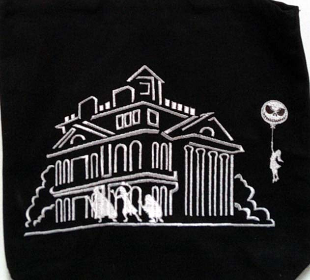 Black haunted house tote bag