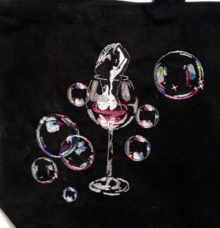 Black canvas tote with naked lady in wine glass