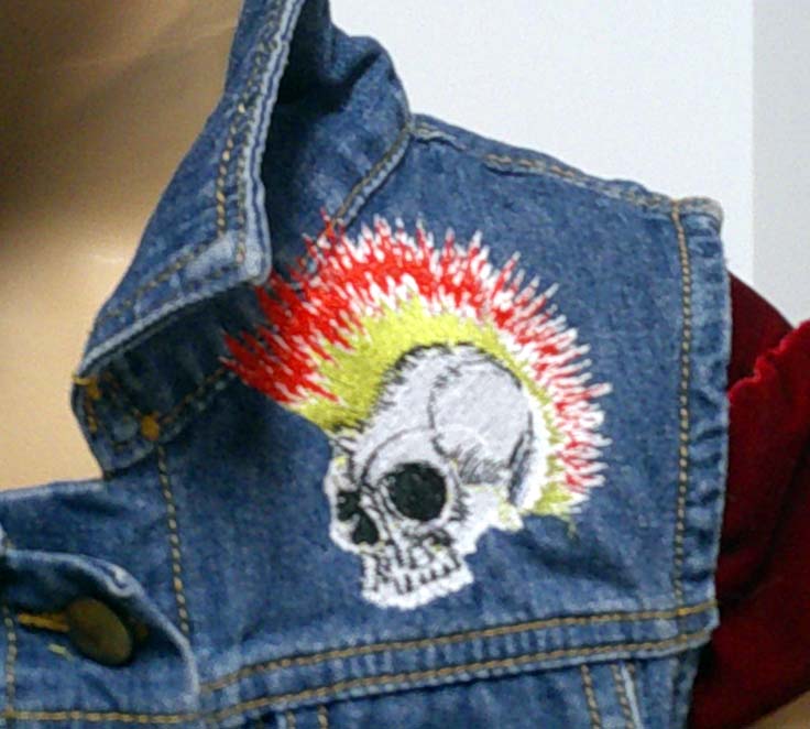 Child's denim sleeveless jacket with punk embroidered motif