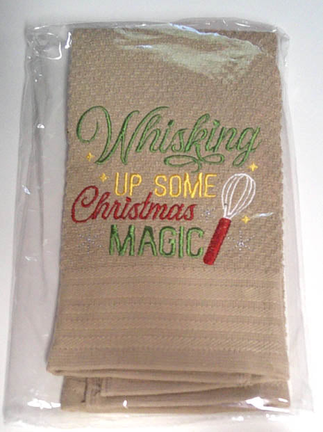 Beige towel with Christmas theme saying embroidered on it.  FREE SHIPPING